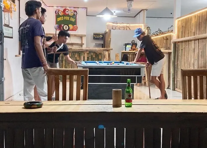 Amed Stop Inn Homestay, Rooftop Restaurant And Bar